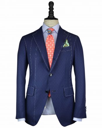 The entirely handcrafted Neapolitan shoulder jacket of Ferruccio Milanesi is a result of over 25,000 mastery-created stitches. The stitches with passion and love by Neapolitan master tailors. Exclusively designed and manufactured the limited quantity of the fabrics to make just 4 suits worldwide. 14 micron unique fabrics.